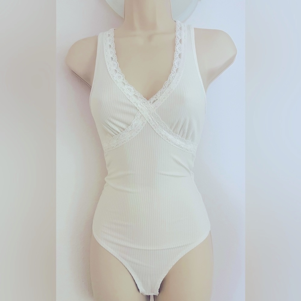 Like new Gaze brand soft off-white colored body suit…soft girl era is now